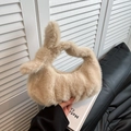 Chic beige faux fur cloud bag with a knotted handle detail for a soft winter look - Light Khaki