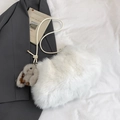 Detail of soft white faux fur bucket bag with a cute grey rabbit plush charm and strap - White With Pendant