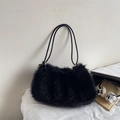 Chic black faux fur shoulder bag with slender leather straps and gold metal buckles - Black