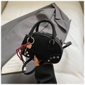 Black suede semi-circle crossbody bag with silver studs and heart charm detail - Black with Pendant