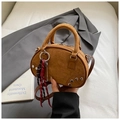 Brown suede crossbody pillow bag with silver rivets and decorative woven pendant - Brown with Pendant