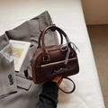 Dunkelbraune Boston-Handtasche mit Wildleder-Patchwork und Schleifentasche im Vintage-Stil - Kaffeebraun