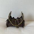 Dark brown quilted suede crossbody bag with vintage gold chain strap and drawstring closure - Brown