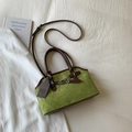 Green suede shoulder bag with brown leather handles and adjustable long strap for women - Green