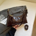 Dark brown glossy underarm bag with pleated texture and adjustable golden hardware - Brown