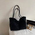 Minimalist large black suede tote bag for work shown with laptop and daily essentials - Black without Pendant