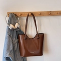 Brown faux leather tote bag with long handles displayed on a wooden wall hanger - No Pendant / Brown