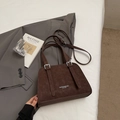 Chic dark brown faux leather pillow bag with silver buckles and retro textured finish - Coffee No Charm