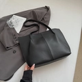 Classic black high-capacity faux leather tote bag with elegant vertical stitching details - No Pendant / Black