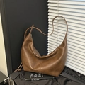 Detail of vintage brown hobo bag with vertical stitching and knotted shoulder strap - Brown No Pendant