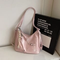Pink faux leather shoulder bag with vintage texture and silver buckle detailing - Pink