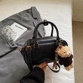 Retro black Boston bag in polished leather with bear charm and adjustable strap - Plush Bear Pendant Style / Black