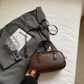Brown embossed leather Boston bag with Mira Mira logo and gold hardware detail - Style Without Charm / Coffee