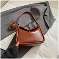 Chic brown faux leather pillow crossbody bag with adjustable wide strap and gold logo - Brown No Pendant