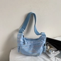 Quilted light blue crossbody bag with wave embroidery and wide nylon strap - Blue Small