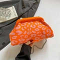 Vibrant orange and pink leopard print knit bag with silver chain strap for women - Orange
