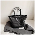 Minimalist large black PU leather tote bag for women with polished finish and shoulder straps - Black