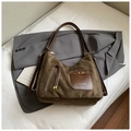 Macro view of brown suede tote bag featuring long tassels and premium leather patch - Dark Green No Charm