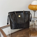 Elegante borsa tote in pelle PU nera con hardware dorato e coulisse laterale decorativa - Nero
