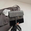 Chic two-tone grey and black frosted shoulder bag with gold buckle and top handle - Black