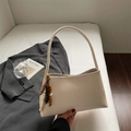 Chic cream white leather underarm bag with beaded charm and elegant letter print - Off White