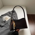 Minimalist dark brown rectangular underarm bag with ethnic wooden bead charm detail - Brown