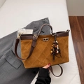Brown quilted suede baguette bag with chain strap and boho wooden bead charm - With Charm / Brown