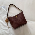 Dark brown suede bucket bag with gold lock and cute bear charm for daily commute - With Charm / Brown