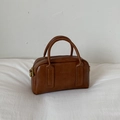 Dunkelbraune Bowling-Tasche aus Kunstleder mit Vintage-Textur und Bronze-Details - Braun Ohne Anhänger