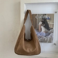 Macro shot of large brown suede tote bag texture and seamless wide shoulder strap - Brown
