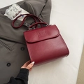 Fashionable dark burgundy PU leather backpack with top handle and embossed logo - Ankara Red Without Charm