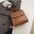 Vintage brown leather backpack with MUHETI SHI SHANG lettering and adjustable straps - Yellow Brown No Pendant