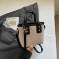 Mini beige canvas bucket bag met zwarte lederen bies en elegante gouden klinknageldetails - Zwart zonder Hanger