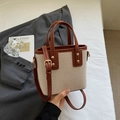 Canvas and brown leather bucket bag with top handle and adjustable shoulder strap - Brown No Pendant