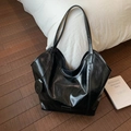 Minimalist black glossy tote bag with large capacity and shiny finish for women - Black