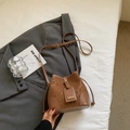 Chic leopard print bucket bag with brown leather trim and adjustable crossbody strap - Brown No Pendant