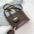 Deep brown leather and fabric bucket bag with handle and adjustable shoulder strap - Brown