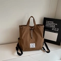 Mochila de lona marrón con cordón y asa superior para viajes casuales y estilo chic - Marrón