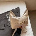 Minimalist beige retro shoulder bag with golden buckle detail on textured faux leather - White