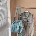 Light blue nylon crossbody bag in casual workwear style with three front pockets - Blue