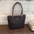Detail of large tote bag with brown geometric pattern and elegant gold metal ring connectors - Dark Coffee