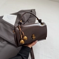 Retro dark brown patent leather crossbody bag with gold twist lock and bell pendants - With Charm / Coffee