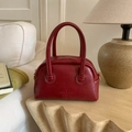 Deep red semi-circular bowling bag with pleated leather texture and double top handles - No Pendant / Burgundy