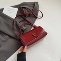 Vintage burgundy leather crossbody bag with knot handle and golden twist lock - No Pendant / Red