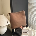 Elegant brown matte suede crossbody bag with minimalist aesthetic and slim strap - Brown No Pendant