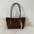 Close-up of deep coffee suede tote bag with stylish ethnic beaded charms and leather trim - With Pendant / Brown