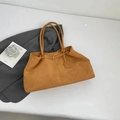 Vintage camel suede tote bag with silver buckle and shoulder strap for daily commuting - Yellow