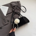 Detail of suede bowling bag with contrast panels, fluffy pom-pom and pearl charm - With Pendant / Black