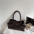 Minimalist dark brown leather tote bag for work shown with laptop and headphones - Coffee