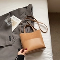 Brown bucket bag in smooth leather and suede with adjustable shoulder strap and gold logo - Khaki No Pendant